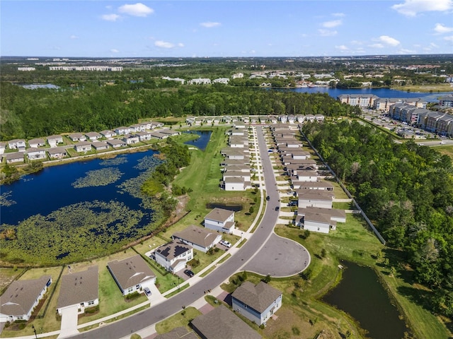 bird's eye view with a residential view and a water view