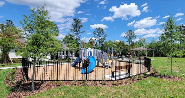 communal playground featuring a gazebo and a yard