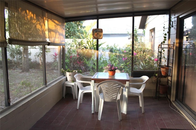 sunroom with a water view