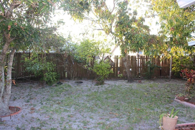 view of yard featuring a fenced backyard