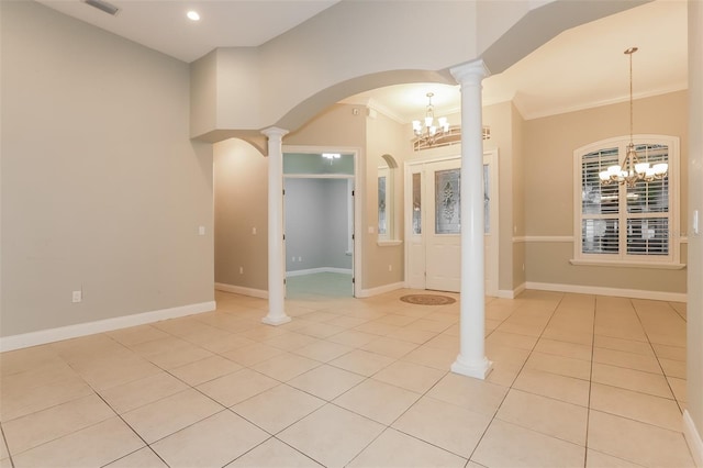 interior space with light tile patterned flooring, baseboards, and an inviting chandelier