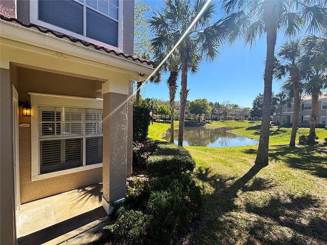 view of yard with a water view