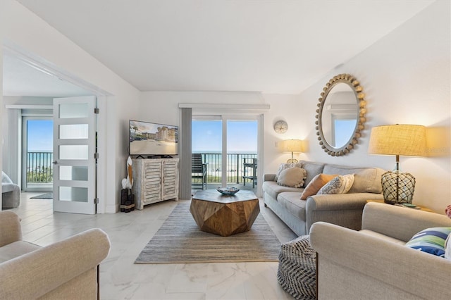 living room featuring marble finish floor