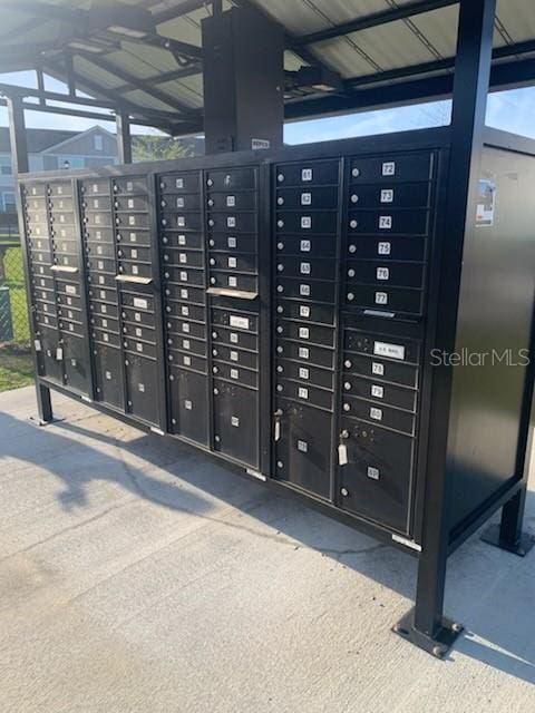 exterior details featuring mail area and a view of city