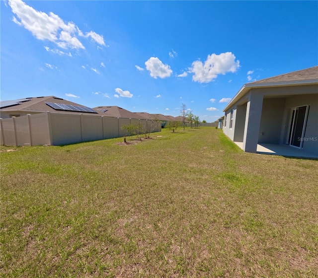 view of yard featuring fence