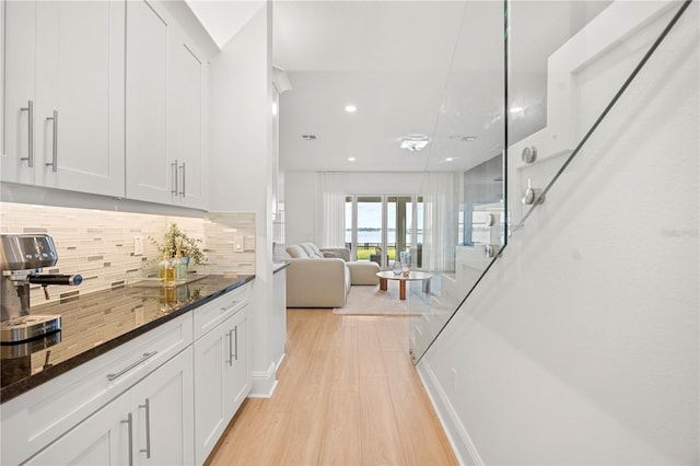 16689 Broadwater Ave, Winter Garden, FL 34787 - bar with decorative backsplash, light wood-style flooring, and recessed lighting
