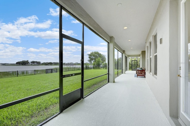 16689 Broadwater Ave, Winter Garden, FL 34787 - unfurnished sunroom with a water view