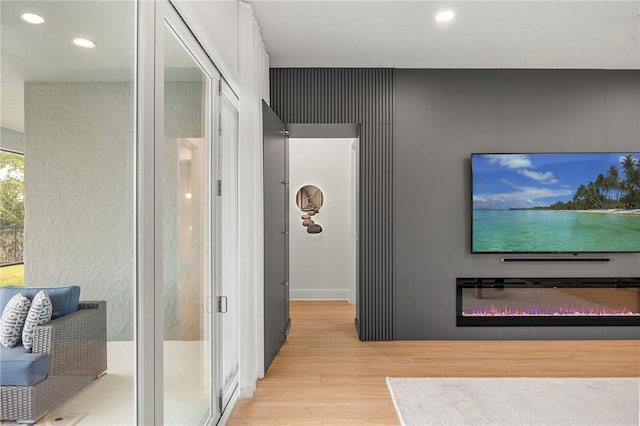 16689 Broadwater Ave, Winter Garden, FL 34787 - hallway featuring light wood finished floors and recessed lighting