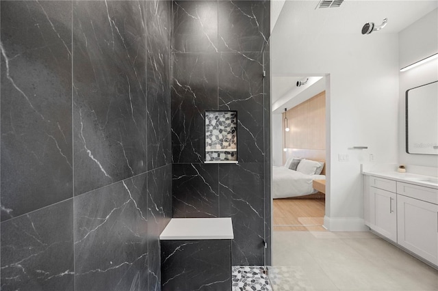 16689 Broadwater Ave, Winter Garden, FL 34787 - full bath featuring vanity, connected bathroom, and a walk in shower