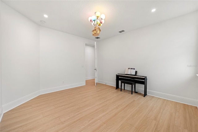 16689 Broadwater Ave, Winter Garden, FL 34787 - unfurnished room featuring baseboards, recessed lighting, a notable chandelier, light wood-style floors, and visible vents
