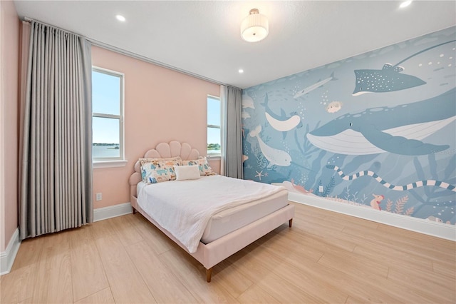 16689 Broadwater Ave, Winter Garden, FL 34787 - bedroom with baseboards, wood finished floors, and recessed lighting