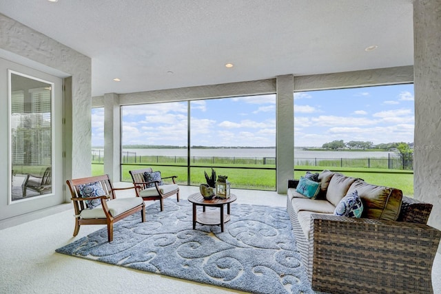 16689 Broadwater Ave, Winter Garden, FL 34787 - sunroom / solarium featuring a water view and carpet flooring