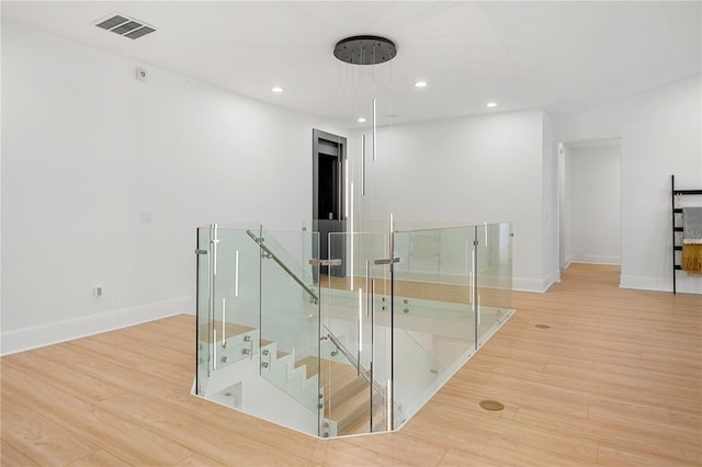 16689 Broadwater Ave, Winter Garden, FL 34787 - stairway featuring wood finished floors and recessed lighting