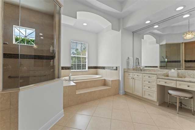bathroom featuring vanity, recessed lighting, tile patterned flooring, a garden tub, and a tile shower