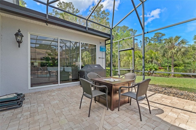 sunroom / solarium featuring outdoor dining space