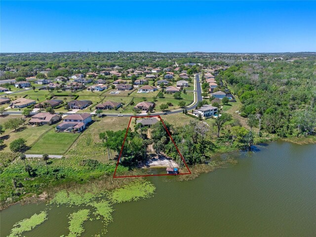 16752 Caravaggio Loop, Montverde, FL 34756 - aerial overview of property's location featuring property parcel outlined and a large body of water