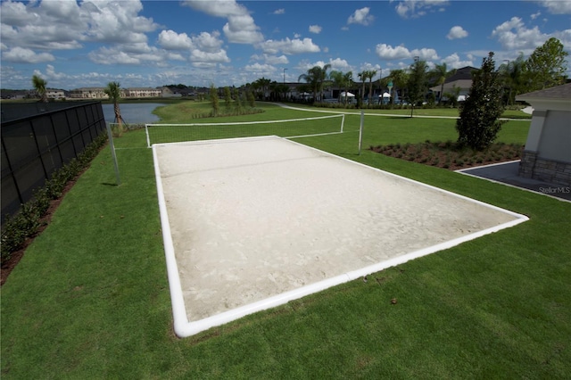 18381 Oliver Twist Way, Winter Garden, FL 34787 - view of property's community featuring a water view, fence, a yard, and volleyball court