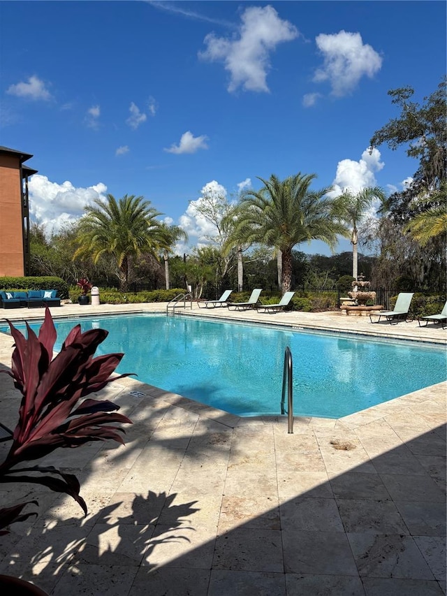 community pool featuring a patio