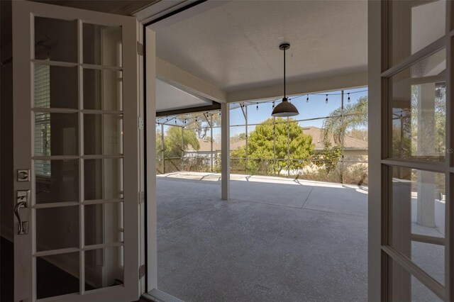 entryway featuring french doors