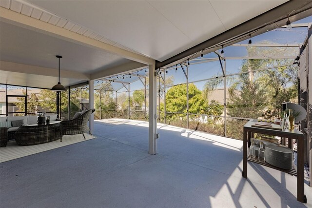 view of patio featuring an outdoor hangout area and a lanai