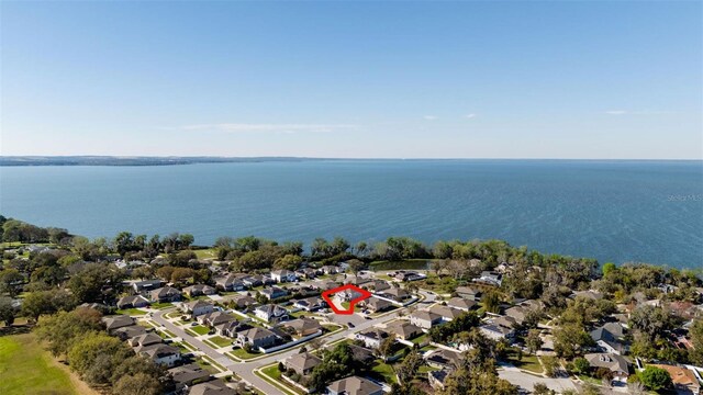 aerial view featuring a residential view and a water view