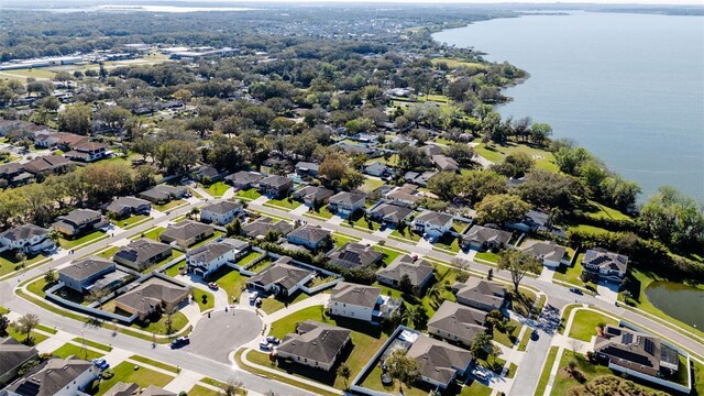aerial view featuring a residential view and a water view