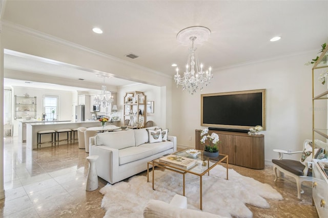 living room featuring visible vents, crown molding, baseboards, recessed lighting, and a notable chandelier