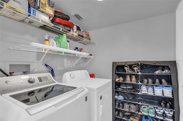 122 Carmel Bay Dr, Sanford, FL 32771 - washroom featuring visible vents, independent washer and dryer, and laundry area