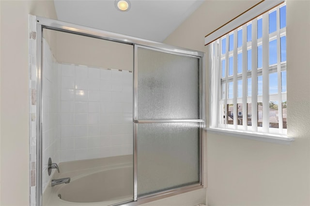 122 Carmel Bay Dr, Sanford, FL 32771 - bathroom featuring shower / bath combination with glass door