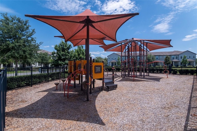 community playground featuring fence
