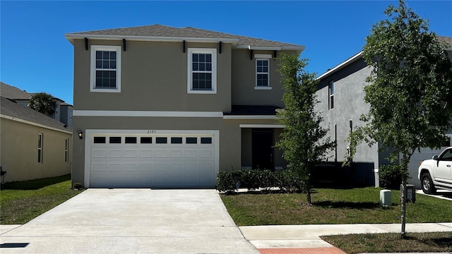 2597 Shamrock St, Tavares, FL 32778 - traditional-style house with concrete driveway, a garage, and stucco siding