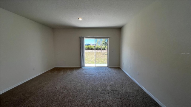 2597 Shamrock St, Tavares, FL 32778 - carpeted spare room featuring baseboards and a textured ceiling