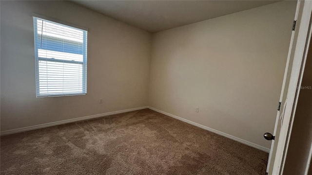 2597 Shamrock St, Tavares, FL 32778 - unfurnished room with baseboards and carpet