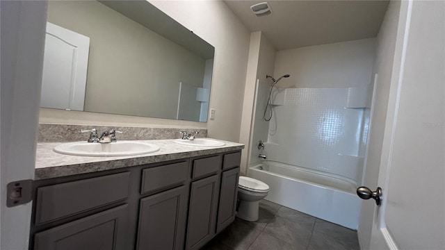 2597 Shamrock St, Tavares, FL 32778 - full bath featuring toilet, washtub / shower combination, visible vents, and a sink