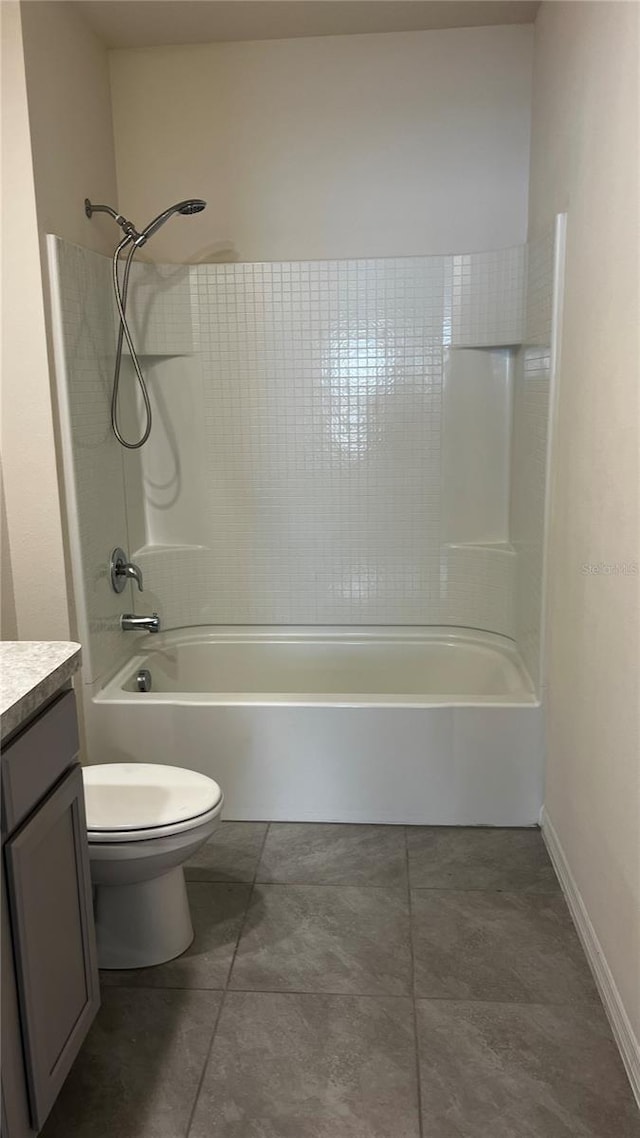 2597 Shamrock St, Tavares, FL 32778 - full bathroom featuring baseboards, toilet, shower / washtub combination, and vanity