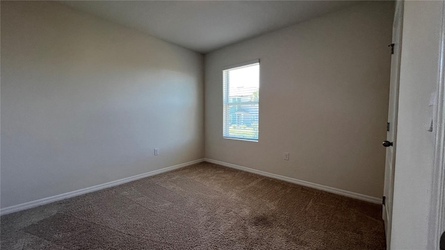 2597 Shamrock St, Tavares, FL 32778 - carpeted empty room with baseboards