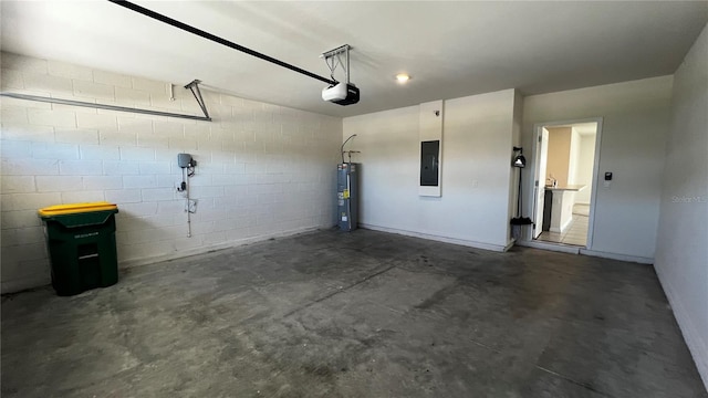 2597 Shamrock St, Tavares, FL 32778 - garage with concrete block wall, electric panel, a garage door opener, and water heater