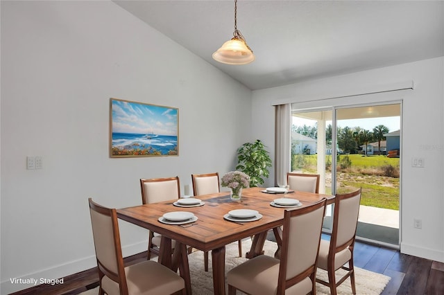 16171 SW 44th Cir, Ocala, FL 34473 - dining space featuring baseboards, dark wood-style floors, and vaulted ceiling