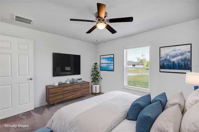 16171 SW 44th Cir, Ocala, FL 34473 - carpeted bedroom with ceiling fan and baseboards
