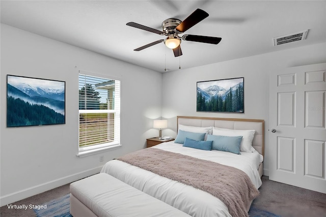16171 SW 44th Cir, Ocala, FL 34473 - bedroom with carpet flooring, baseboards, and ceiling fan