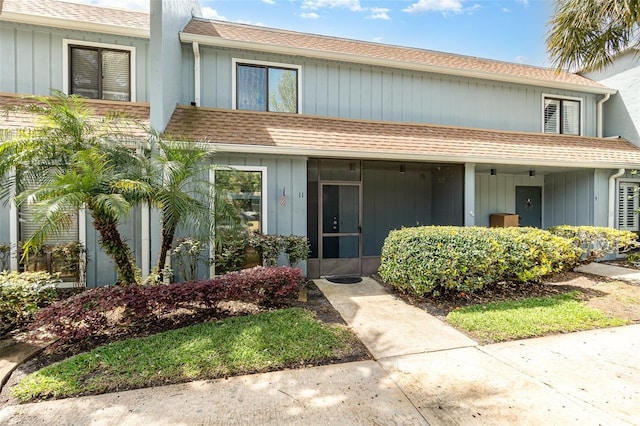 40 Moree Loop Unit 11, Winter Springs, FL 32708 - view of property with roof with shingles