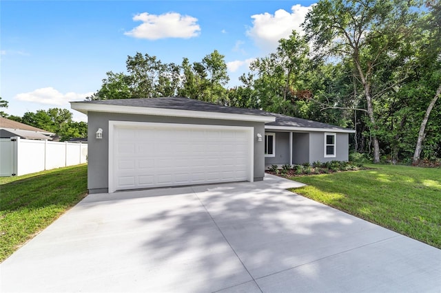 23741 SW Blueberry Ln, Dunnellon, FL 34431 - ranch-style house with stucco siding, driveway, and a garage