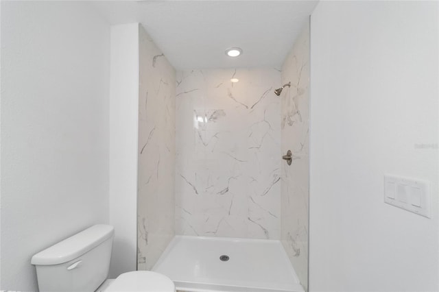 23741 SW Blueberry Ln, Dunnellon, FL 34431 - bathroom featuring toilet and a marble finish shower