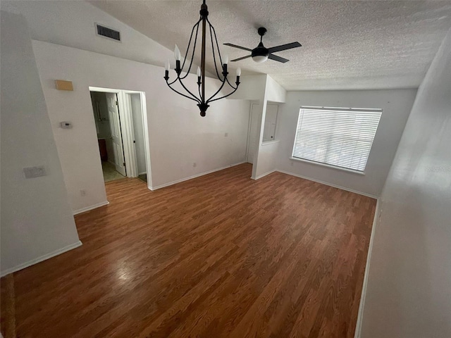 5417 Lake Margaret Dr Unit 39, Orlando, FL 32812 - interior space featuring visible vents, baseboards, vaulted ceiling, wood finished floors, and a textured ceiling