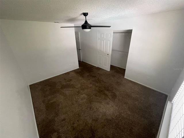 5417 Lake Margaret Dr Unit 39, Orlando, FL 32812 - unfurnished bedroom featuring ceiling fan, a closet, carpet floors, and a textured ceiling