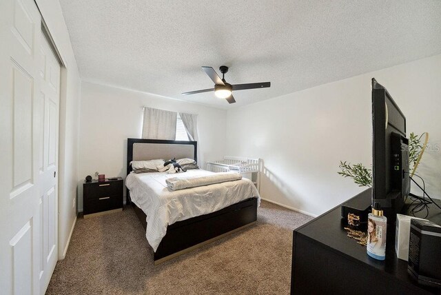 5417 Lake Margaret Dr Unit 39, Orlando, FL 32812 - bedroom featuring carpet, ceiling fan, and a textured ceiling