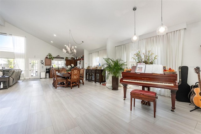 3244 Amaca Cir, Orlando, FL 32837 - dining room featuring a chandelier and high vaulted ceiling