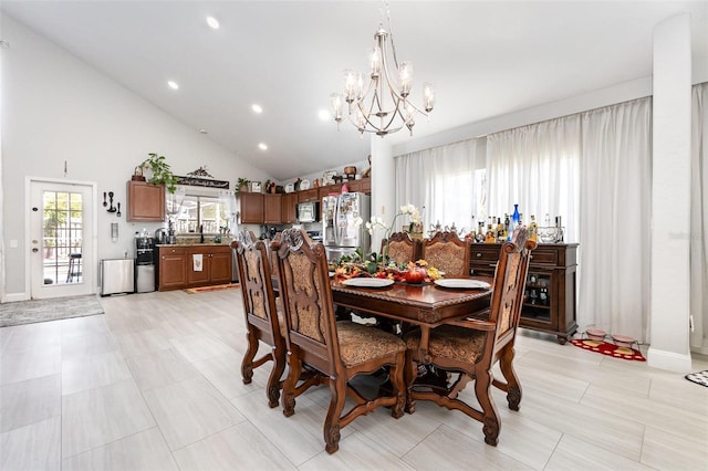 3244 Amaca Cir, Orlando, FL 32837 - dining room with a chandelier, recessed lighting, and high vaulted ceiling