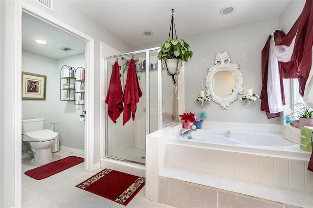 3244 Amaca Cir, Orlando, FL 32837 - bathroom with a shower stall, a bath, toilet, tile patterned floors, and recessed lighting