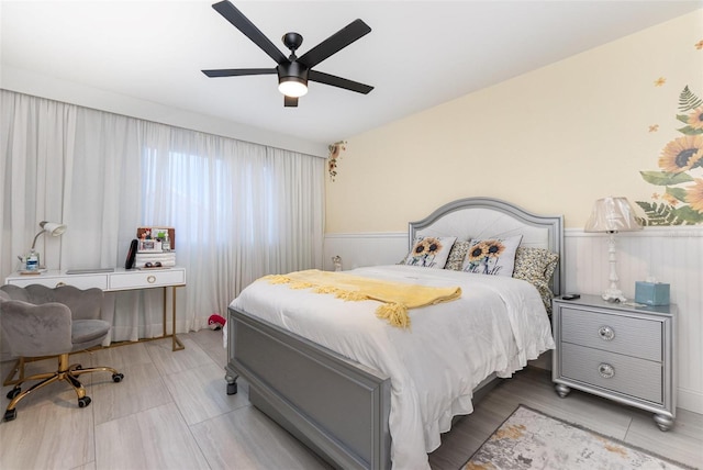 3244 Amaca Cir, Orlando, FL 32837 - bedroom with wainscoting and ceiling fan